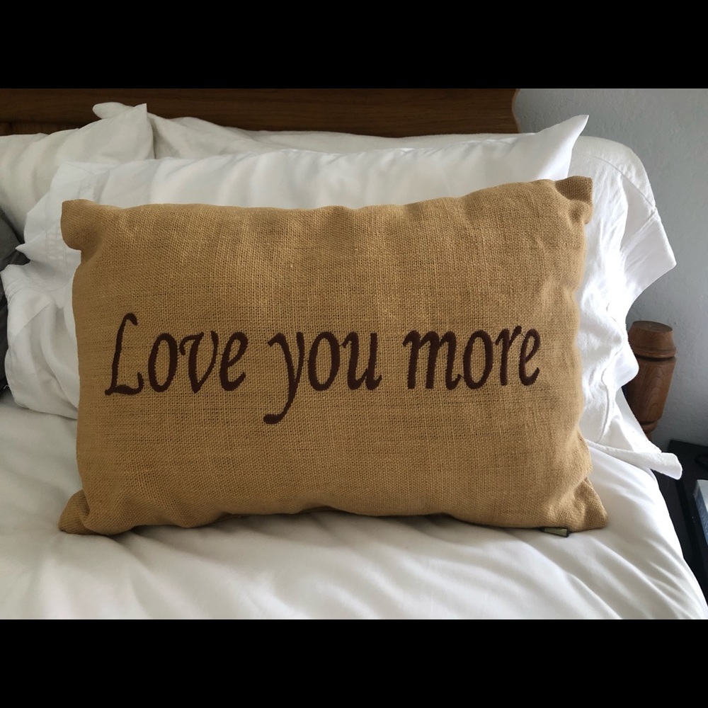 “Love you more” pillow